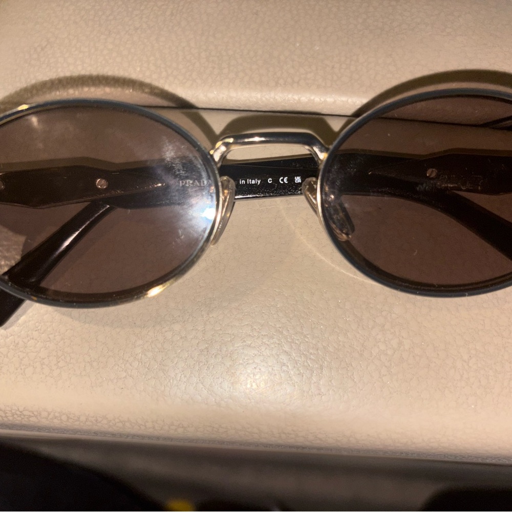 Prada Black and Gold Round Sunglasses
